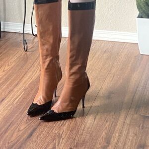 Elegant Tan and Black Heeled Boots